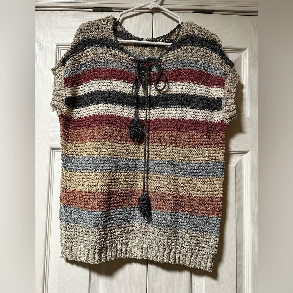 Lightweight, short sleeve sweater.
